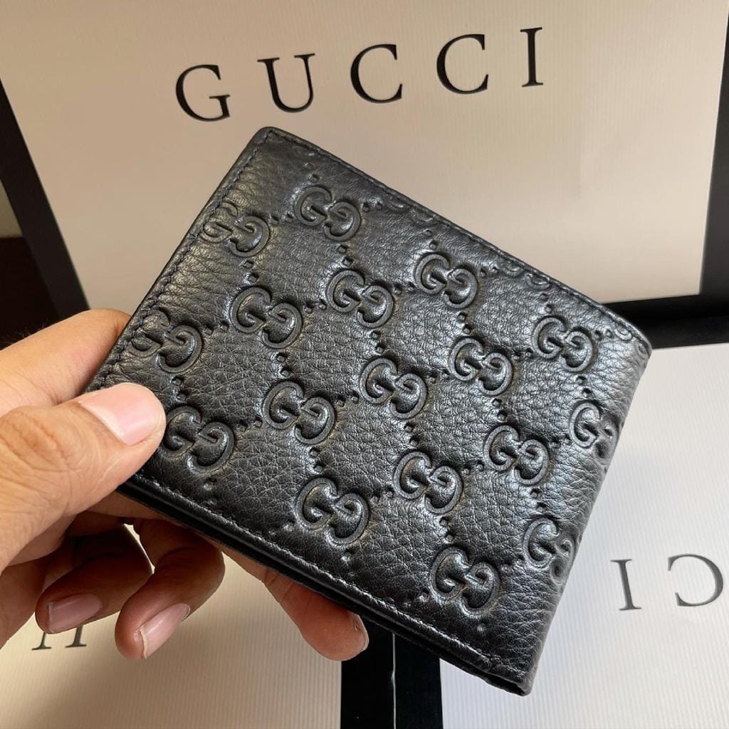 Gucci Reverse GG Embossed Black Leather Men’s Wallet