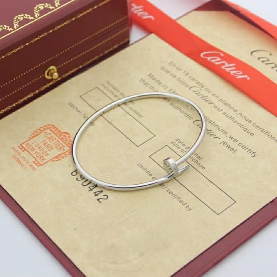 fc0ced73-510a-4bf9-b9e5-0fe6ddc18d32 Cartier Silver Color Nail Bangle Braclet