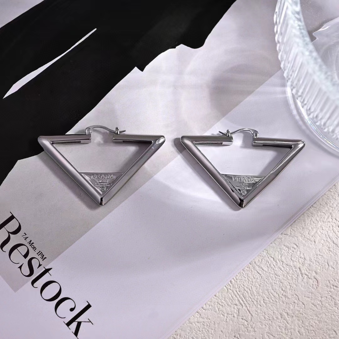 WhatsApp Image 2025-03-06 at 6.04.01 PM Prada Silver Triangle Earring