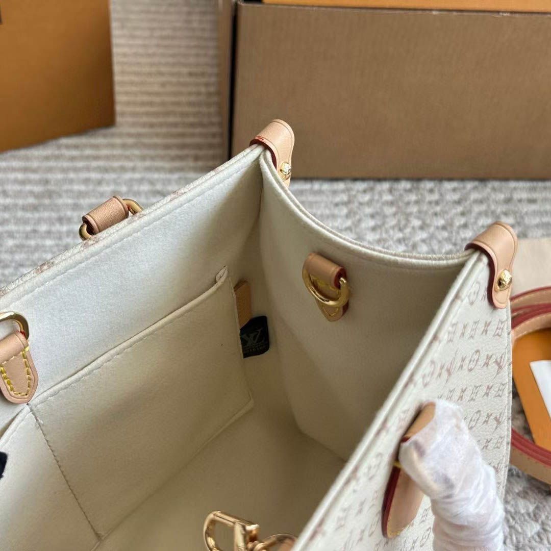 WhatsApp Image 2025-09-08 at 5.08.43 PM (1) Louis Vuitton On The Go PM Beige Tote (With Double Box Packaging)