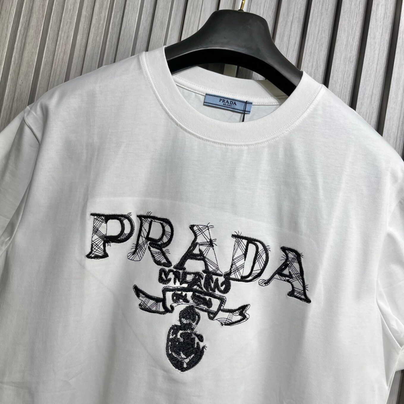 WhatsApp Image 2025-09-11 at 5.09.16 PM (1) Prada Embroidered Logo White Tshirt For Men