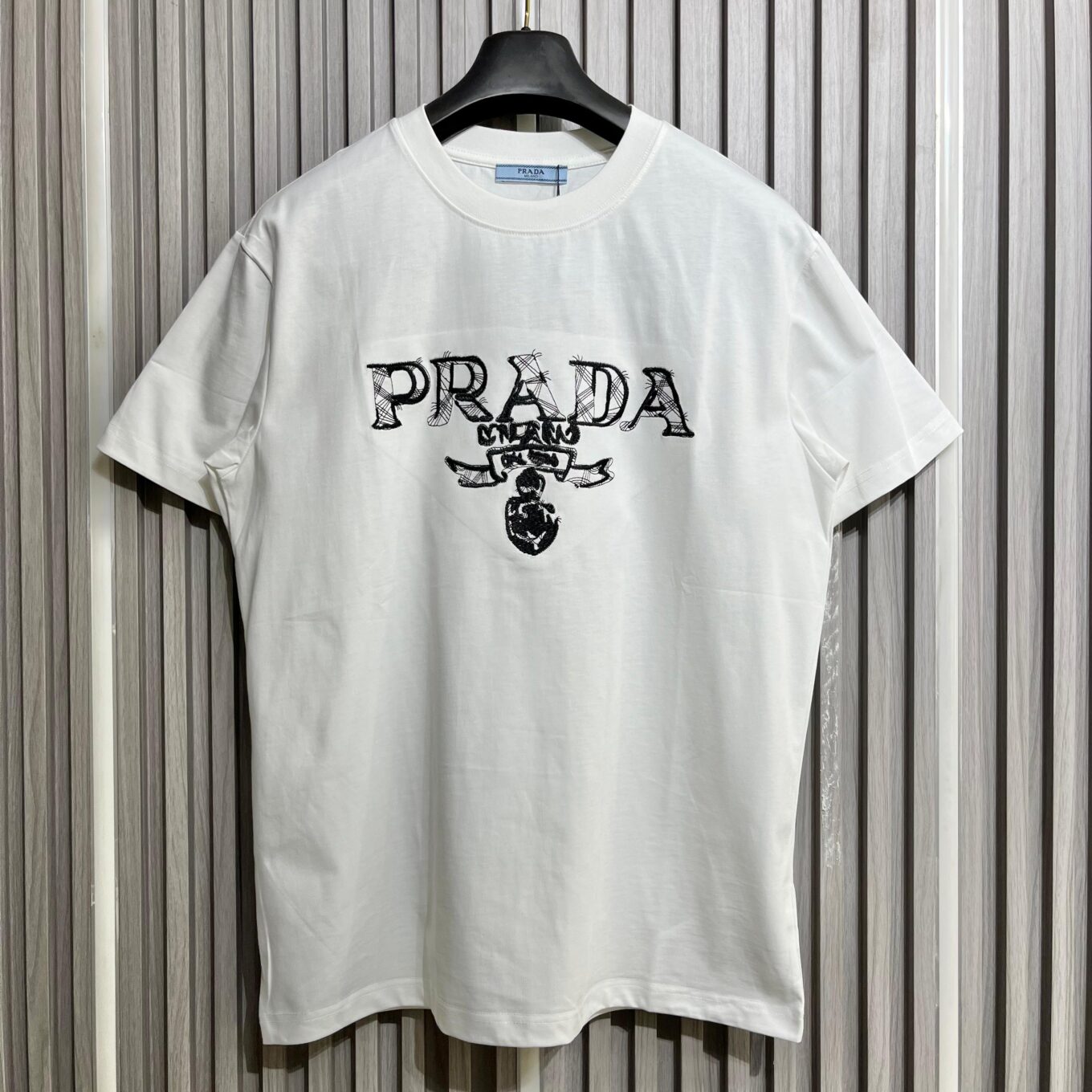 WhatsApp Image 2025-09-11 at 5.09.16 PM Prada Embroidered Logo White Tshirt For Men