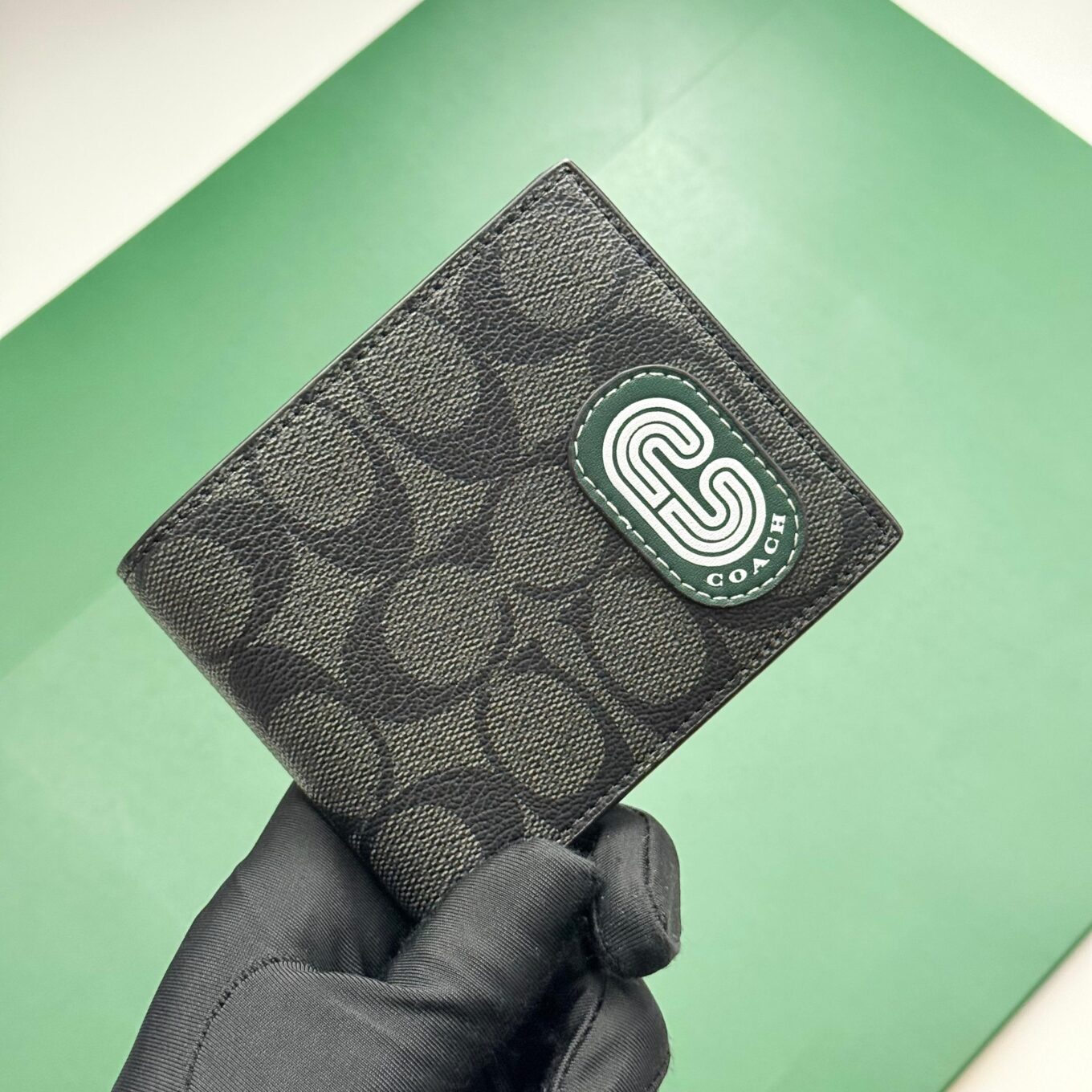 WhatsApp Image 2025-09-29 at 5.55.08 PM Coach Black Canvas Green Patch Men’s Wallet With Card Holder