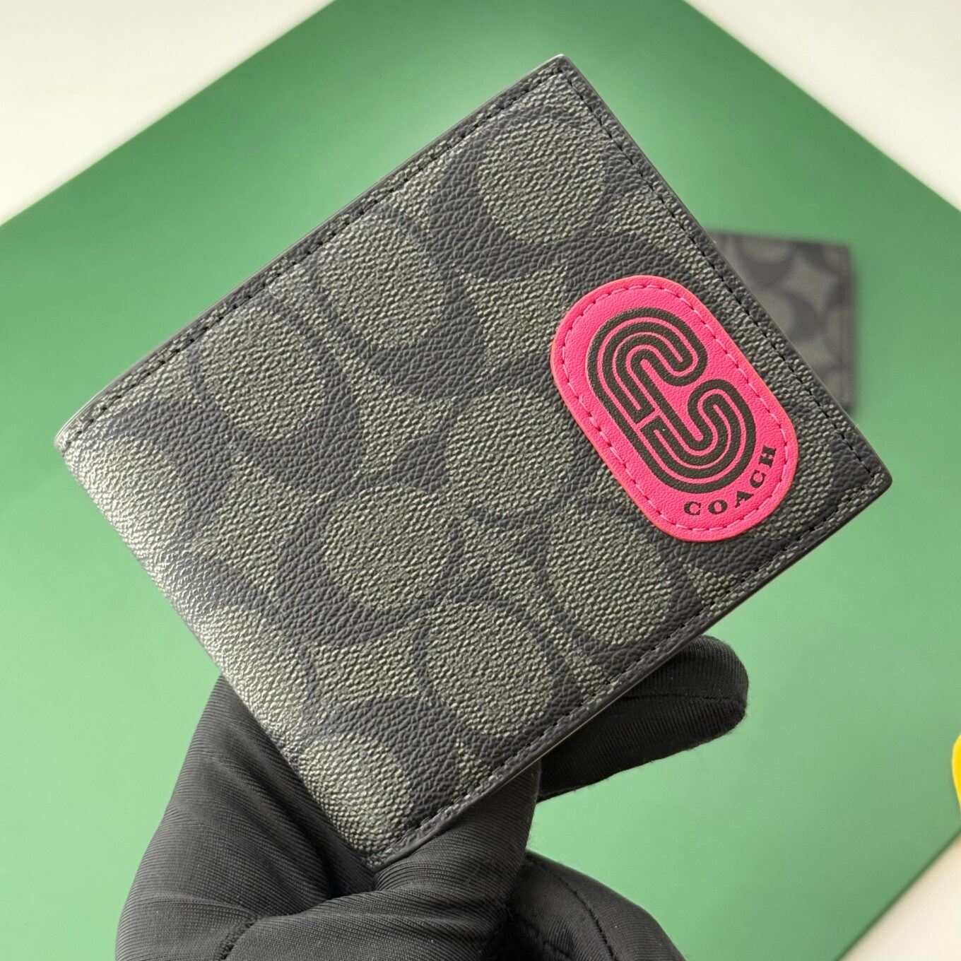 WhatsApp Image 2025-09-29 at 5.56.00 PM Coach Black Canvas Pink Patch Men’s Wallet With Card Holder