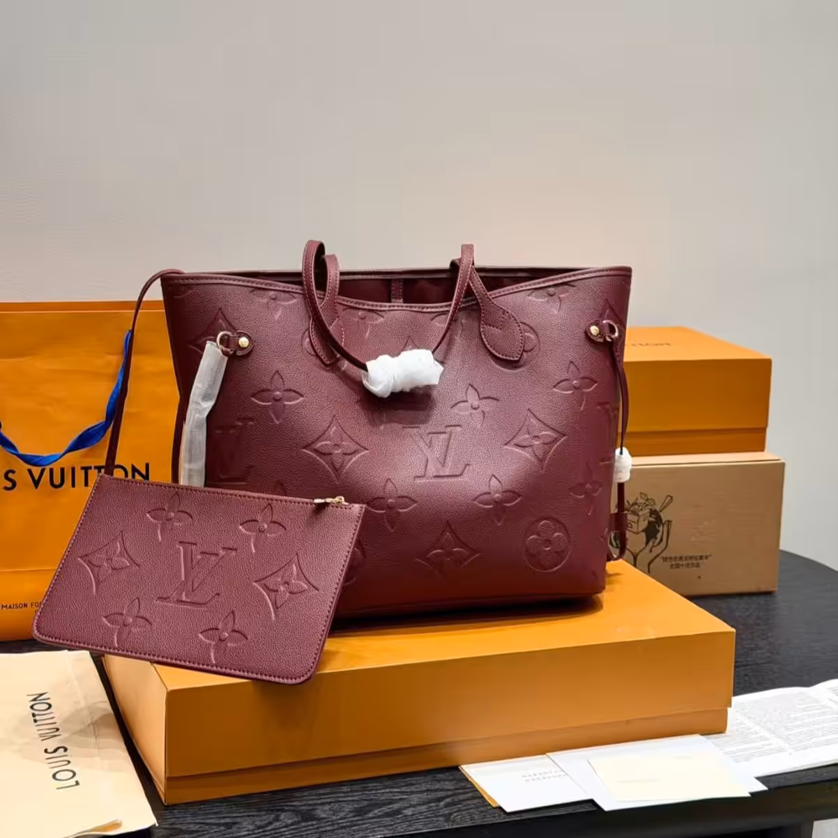 WhatsApp Image 2025-12-02 at 7.52.01 PM Louis Vuitton Wine Embossed Neverfull MM Tote Bag (With Box )