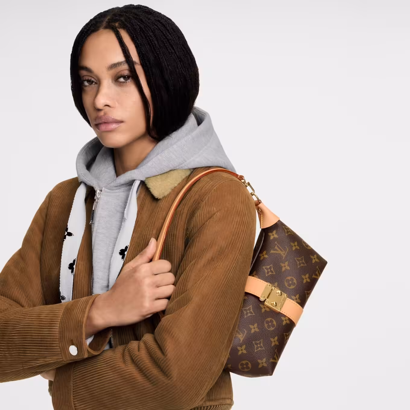 WhatsApp Image 2025-12-18 at 8.25.41 PM (1) Louis Vuitton Pochette Mia Premium Hand Bag (With Double Box)