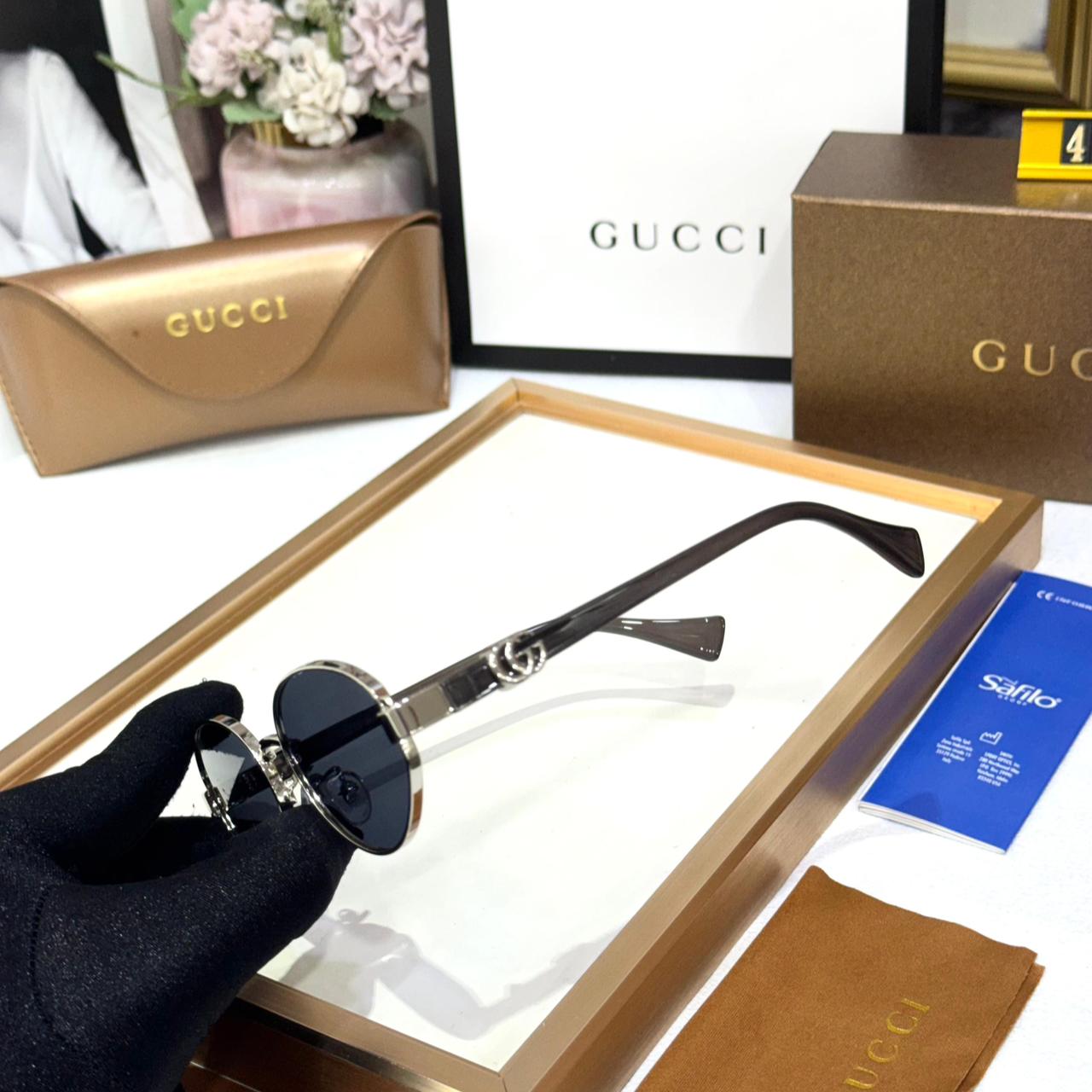 Gucci Silver Oval Unisex Sunglasses